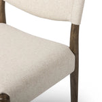A midcentury-inspired piece, updated for modern times. A supportive back and seat cushion are upholstered in high-performance fabric, with a walnut-finished frame for a contrast of color. Steam regularly to keep fabric looking crisp. Amethyst Home provides interior design, new home construction design consulting, vintage area rugs, and lighting in the Salt Lake City metro area.