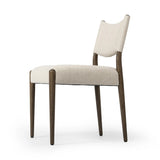 A midcentury-inspired piece, updated for modern times. A supportive back and seat cushion are upholstered in high-performance fabric, with a walnut-finished frame for a contrast of color. Steam regularly to keep fabric looking crisp. Amethyst Home provides interior design, new home construction design consulting, vintage area rugs, and lighting in the Scottsdale metro area.
