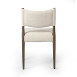 A midcentury-inspired piece, updated for modern times. A supportive back and seat cushion are upholstered in high-performance fabric, with a walnut-finished frame for a contrast of color. Steam regularly to keep fabric looking crisp. Amethyst Home provides interior design, new home construction design consulting, vintage area rugs, and lighting in the Washington metro area.