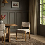 A midcentury-inspired piece brought to modern times. A supportive, sling-style back and seat cushion are upholstered in a soft, velvety fabric, with toasted oak armless framing Amethyst Home provides interior design, new home construction design consulting, vintage area rugs, and lighting in the Calabasas metro area.