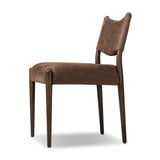 A midcentury-inspired piece brought to modern times. A supportive, sling-style back and seat cushion are upholstered in a soft, velvety fabric, with toasted oak armless framing Amethyst Home provides interior design, new home construction design consulting, vintage area rugs, and lighting in the Austin metro area.