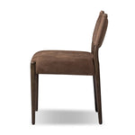 A midcentury-inspired piece brought to modern times. A supportive, sling-style back and seat cushion are upholstered in a soft, velvety fabric, with toasted oak armless framing Amethyst Home provides interior design, new home construction design consulting, vintage area rugs, and lighting in the Laguna Beach metro area.