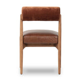 Featuring Jazelle Altair Sienna Dining Chair by Four Hands at Amethyst Home. The armless dining chair gets a playful update with a bolstered cylinder seat back. Made from top-grain leather and warm-finished oak to elevate your bar, kitchen or dining space. Overall Dimensions: 22.25"w x 25.75"d x 32.25"h. Amethyst Home provides interior design, new home construction design consulting, vintage area rugs, and lighting in the Houston metro area.