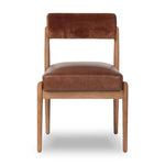 Featuring Jazelle Altair Sienna Dining Chair by Four Hands at Amethyst Home. The armless dining chair gets a playful update with a bolstered cylinder seat back. Made from top-grain leather and warm-finished oak to elevate your bar, kitchen or dining space. Overall Dimensions: 22.25"w x 25.75"d x 32.25"h. Amethyst Home provides interior design, new home construction design consulting, vintage area rugs, and lighting in the Scottsdale metro area.