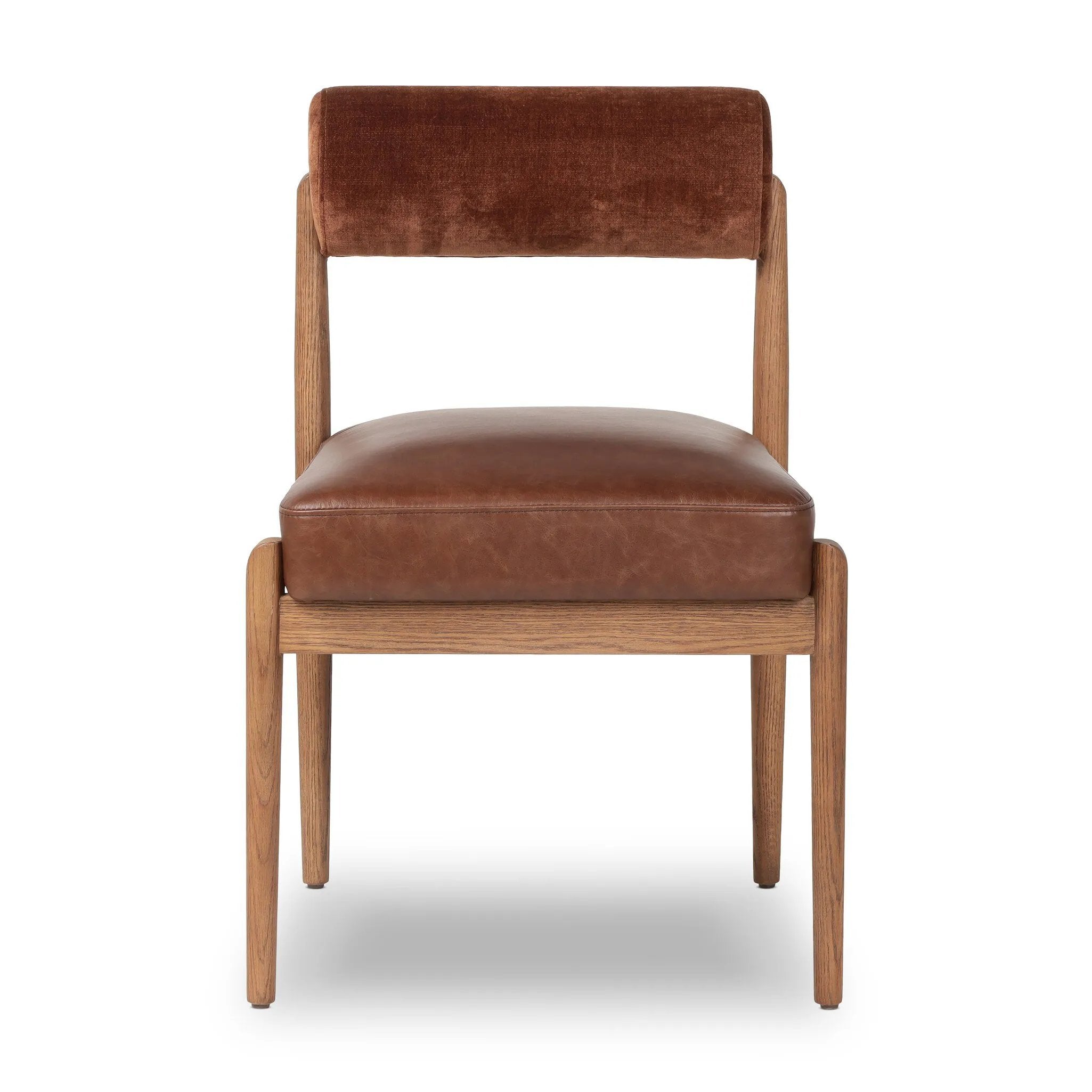 Featuring Jazelle Altair Sienna Dining Chair by Four Hands at Amethyst Home. The armless dining chair gets a playful update with a bolstered cylinder seat back. Made from top-grain leather and warm-finished oak to elevate your bar, kitchen or dining space. Overall Dimensions: 22.25"w x 25.75"d x 32.25"h. Amethyst Home provides interior design, new home construction design consulting, vintage area rugs, and lighting in the Scottsdale metro area.