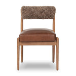 Featuring Jazelle Taupe Shearling Dining Chair by Four Hands at Amethyst Home. The armless dining chair gets a playful update with mixed materials and a bolstered cylinder seat back. Inspired by midcentury and Seventies styling and made from solid oak, top-grain leather  and soft shearling to elevate your bar, kitchen or dining space. Overall Dimensions. Amethyst Home provides interior design, new home construction design consulting, vintage area rugs, and lighting in the Winter Garden metro area.