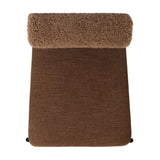 The armless dining chair gets a playful update with a bolstered cylinder seat back. Made from soft shearling and hammered met