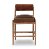 The classic counter stool gets a playful update with a bolstered cylinder seat back. Made from top-grain leather, velvet-like upholstery and warm-finished oak to elevate your bar, kitchen or dining space Amethyst Home provides interior design, new home construction design consulting, vintage area rugs, and lighting in the Alpharetta metro area.