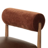 The classic counter stool gets a playful update with a bolstered cylinder seat back. Made from top-grain leather, velvet-like upholstery and warm-finished oak to elevate your bar, kitchen or dining space Amethyst Home provides interior design, new home construction design consulting, vintage area rugs, and lighting in the Des Moines metro area.