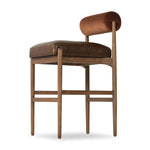 The classic counter stool gets a playful update with a bolstered cylinder seat back. Made from top-grain leather, velvet-like upholstery and warm-finished oak to elevate your bar, kitchen or dining space Amethyst Home provides interior design, new home construction design consulting, vintage area rugs, and lighting in the Los Angeles metro area.