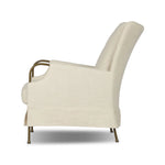 Bridging timeless tradition with modern edge, this upholstered chair strikes a one-of-a-kind silhouette. Its fixed, skirted slipcover and subtle winged back offer a classic feel, while a unique metal arm reveal  and slightly flared legs create an unparalleled look. Amethyst Home provides interior design, new home construction design consulting, vintage area rugs, and lighting in the Kansas City metro area.