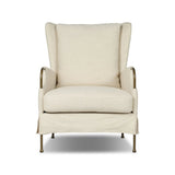 Bridging timeless tradition with modern edge, this upholstered chair strikes a one-of-a-kind silhouette. Its fixed, skirted slipcover and subtle winged back offer a classic feel, while a unique metal arm reveal  and slightly flared legs create an unparalleled look. Amethyst Home provides interior design, new home construction design consulting, vintage area rugs, and lighting in the Miami metro area.
