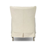 Bridging timeless tradition with modern edge, this upholstered chair strikes a one-of-a-kind silhouette. Its fixed, skirted slipcover and subtle winged back offer a classic feel, while a unique metal arm reveal  and slightly flared legs create an unparalleled look. Amethyst Home provides interior design, new home construction design consulting, vintage area rugs, and lighting in the Scottsdale metro area.
