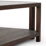 Featuring Jenzen Tempered Glass Coffee Table by Four Hands at Amethyst Home. Mix materials for a timeless look. Warm, brown oak shapes a unique octagon frame for a tempered glass top. Lower open shelving brings bonus storage and display options to your living space. Overall Dimensions: 48.00"w x 48.00"d x 16.50"h. Amethyst Home provides interior design, new home construction design consulting, vintage area rugs, and lighting in the San Diego metro area.