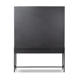 Storage-driven cabinetry inspired by angular geometry. Rich with monochromatic presence, a black-finished metal cabinet pairs with an airy iron base for a balance in scale. Three drawers bring even more storage, with bi-fold glass doors for display options. Minimalist bronzed hardware completes the look Amethyst Home provides interior design, new home construction design consulting, vintage area rugs, and lighting in the Nashville metro area.