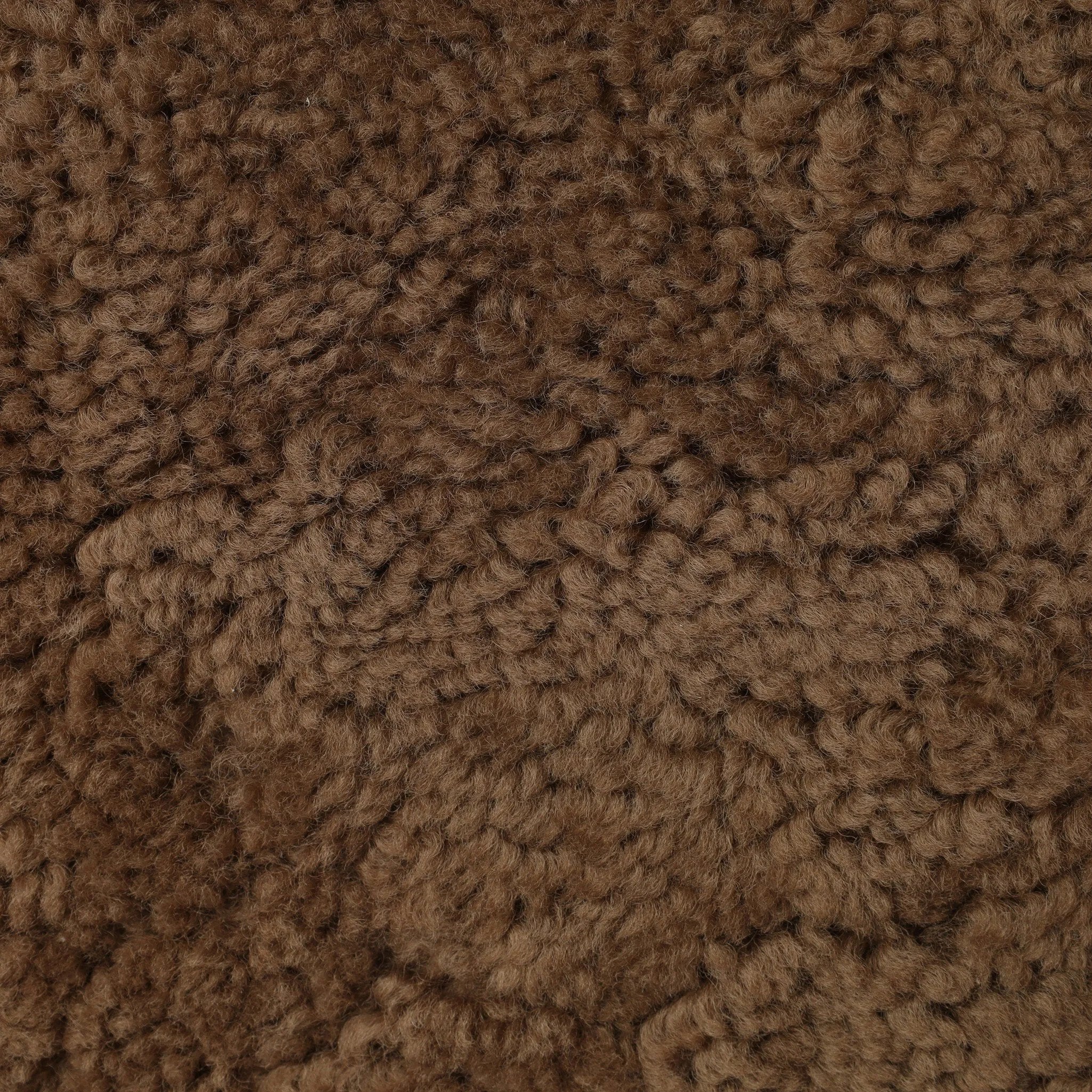 Small scale, big personality. This petite, shearling ottoman pairs a rounded upholstered seat with rugged, hammered black feet for a hand-crafted look.As lovers of modern materials at Amethyst, we love the nature inspired Joey Ottoman - Amber Shearling. This item pairs well with other brands such as Loloi Rugs and is perfect for coastal homes Amethyst Home provides interior design, new home construction design consulting, vintage area rugs, and lighting in the Kansas City metro area.