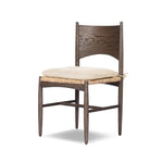 Featuring Jovan Savile Flax Dining Chair With Cushion by Four Hands at Amethyst Home. A seamless addition to your dining collection, a slim-profile dining chair pairs a woven banana leaf seat with a solid oak frame featuring a bentwood back. A tie-fasten seat cushion of high-performance fabric completes the look. Performance fabrics are specially created to wi. Amethyst Home provides interior design, new home construction design consulting, vintage area rugs, and lighting in the Boston metro area.