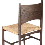 A seamless addition to your dining collection, a slim-profile dining chair pairs a woven banana leaf seat with a solid oak frame featuring a bentwood back Amethyst Home provides interior design, new home construction design consulting, vintage area rugs, and lighting in the Laguna Beach metro area.