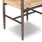 A seamless addition to your dining collection, a slim-profile dining chair pairs a woven banana leaf seat with a solid oak frame featuring a bentwood back Amethyst Home provides interior design, new home construction design consulting, vintage area rugs, and lighting in the Omaha metro area.