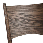 A seamless addition to your dining collection, a slim-profile dining chair pairs a woven banana leaf seat with a solid oak frame featuring a bentwood back Amethyst Home provides interior design, new home construction design consulting, vintage area rugs, and lighting in the Portland metro area.