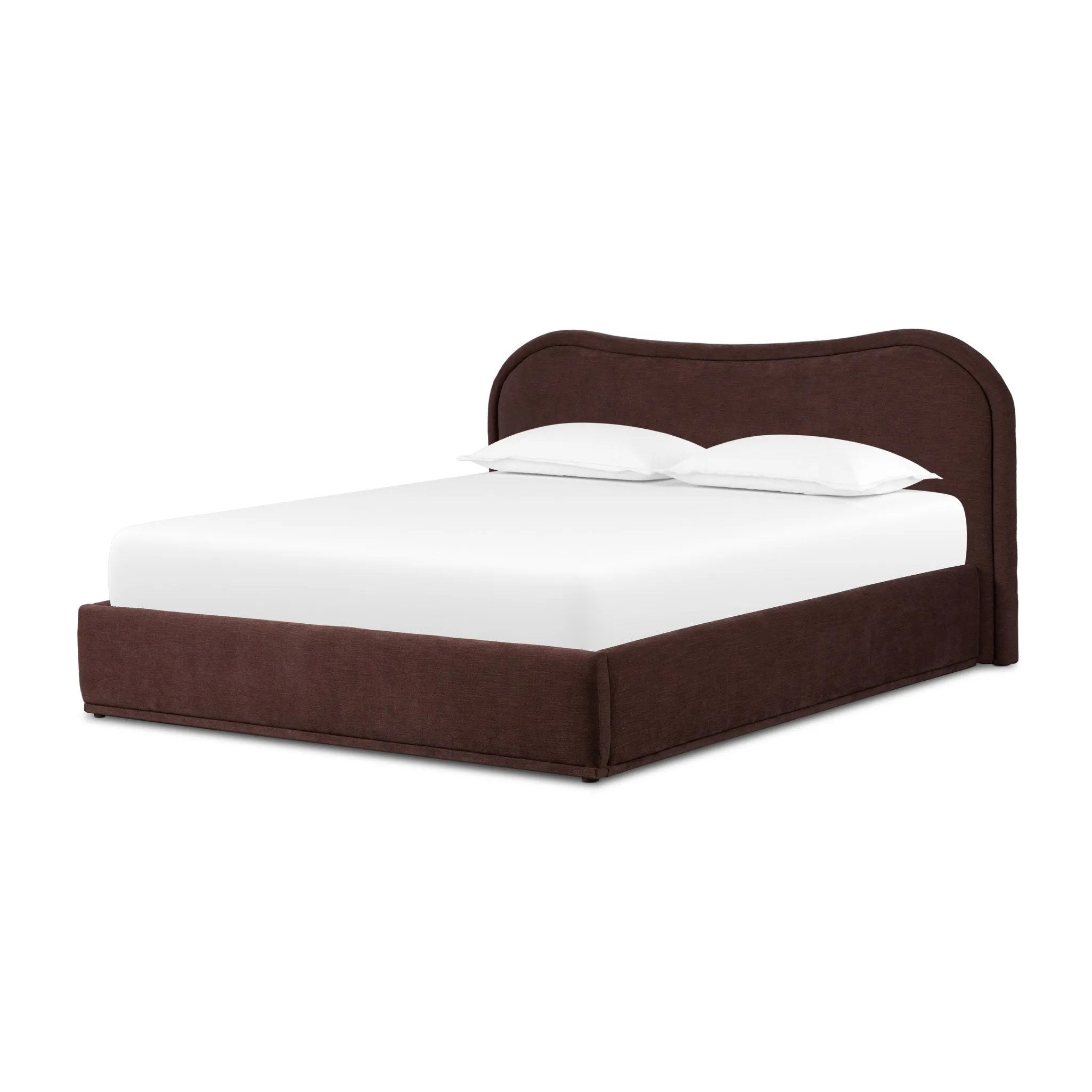 Subtly curved, this swooping bed frame is fully upholstered in a soft, plum-hue fabric for an inviting look that's rich in comfort Amethyst Home provides interior design, new home construction design consulting, vintage area rugs, and lighting in the Austin metro area.