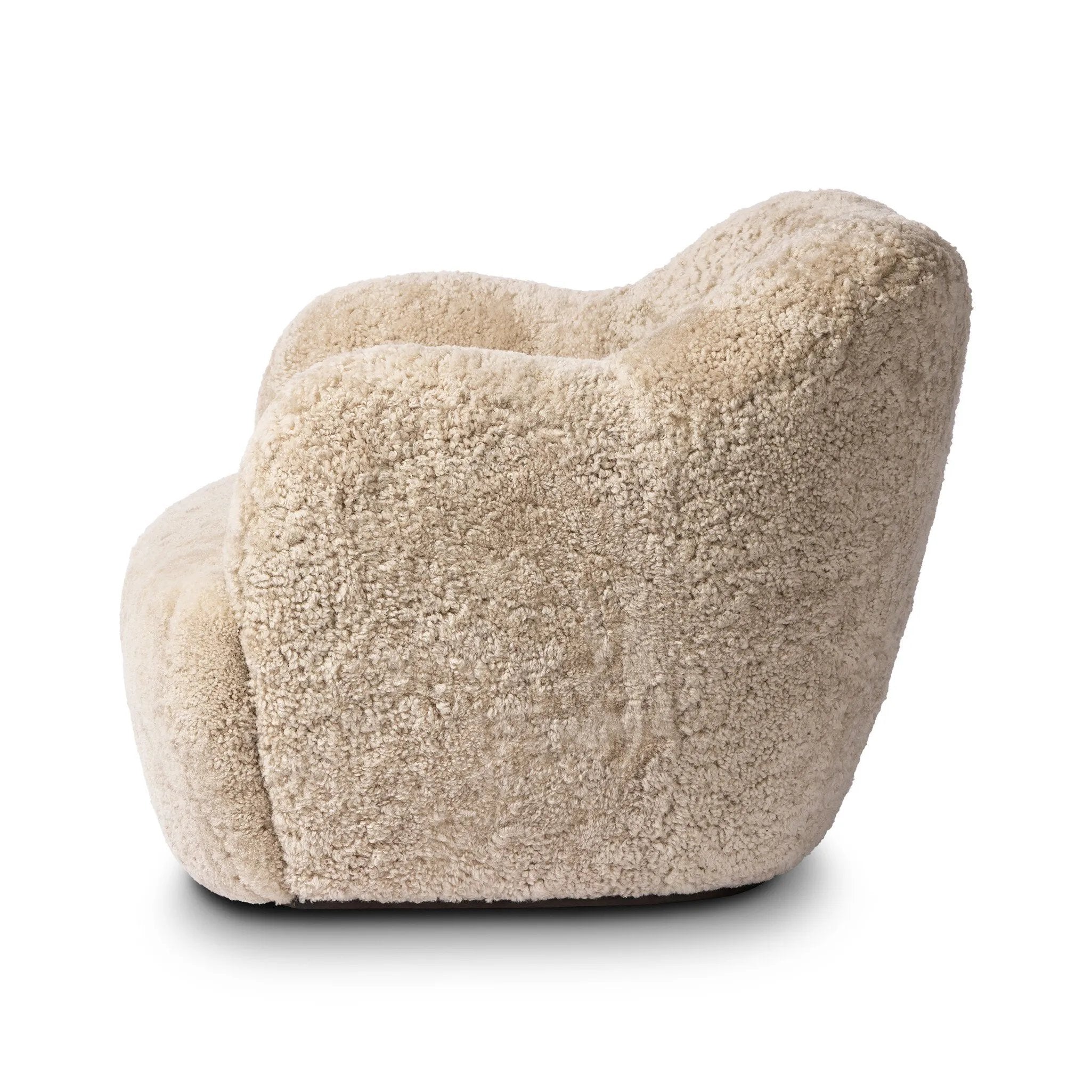 With a supple pile that's soft to the touch, taupe shearling upholstery pairs with an S-spring seat and enveloped frame for an inviting look and feel on this 360-degree swivel chair Amethyst Home provides interior design, new home construction design consulting, vintage area rugs, and lighting in the Alpharetta metro area.