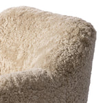 With a supple pile that's soft to the touch, taupe shearling upholstery pairs with an S-spring seat and enveloped frame for an inviting look and feel on this 360-degree swivel chair Amethyst Home provides interior design, new home construction design consulting, vintage area rugs, and lighting in the Miami metro area.