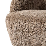 Featuring Julius Taupe Shearling Swivel Chair by Four Hands at Amethyst Home. With a supple pile that's soft to the touch, taupe shearling upholstery pairs with an S-spring seat and enveloped frame for an inviting look and feel on this 360-degree swivel chair.Overall Dimensions: 35.00"w x 36.00"d x 29.50"hWeight : 63.93 lbsMaterials: Shearling, Solid P. Amethyst Home provides interior design, new home construction design consulting, vintage area rugs, and lighting in the Salt Lake City metro area.