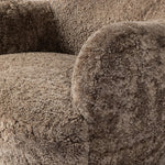 Featuring Julius Taupe Shearling Swivel Chair by Four Hands at Amethyst Home. With a supple pile that's soft to the touch, taupe shearling upholstery pairs with an S-spring seat and enveloped frame for an inviting look and feel on this 360-degree swivel chair.Overall Dimensions: 35.00"w x 36.00"d x 29.50"hWeight : 63.93 lbsMaterials: Shearling, Solid Parawo. Amethyst Home provides interior design, new home construction design consulting, vintage area rugs, and lighting in the San Diego metro area.