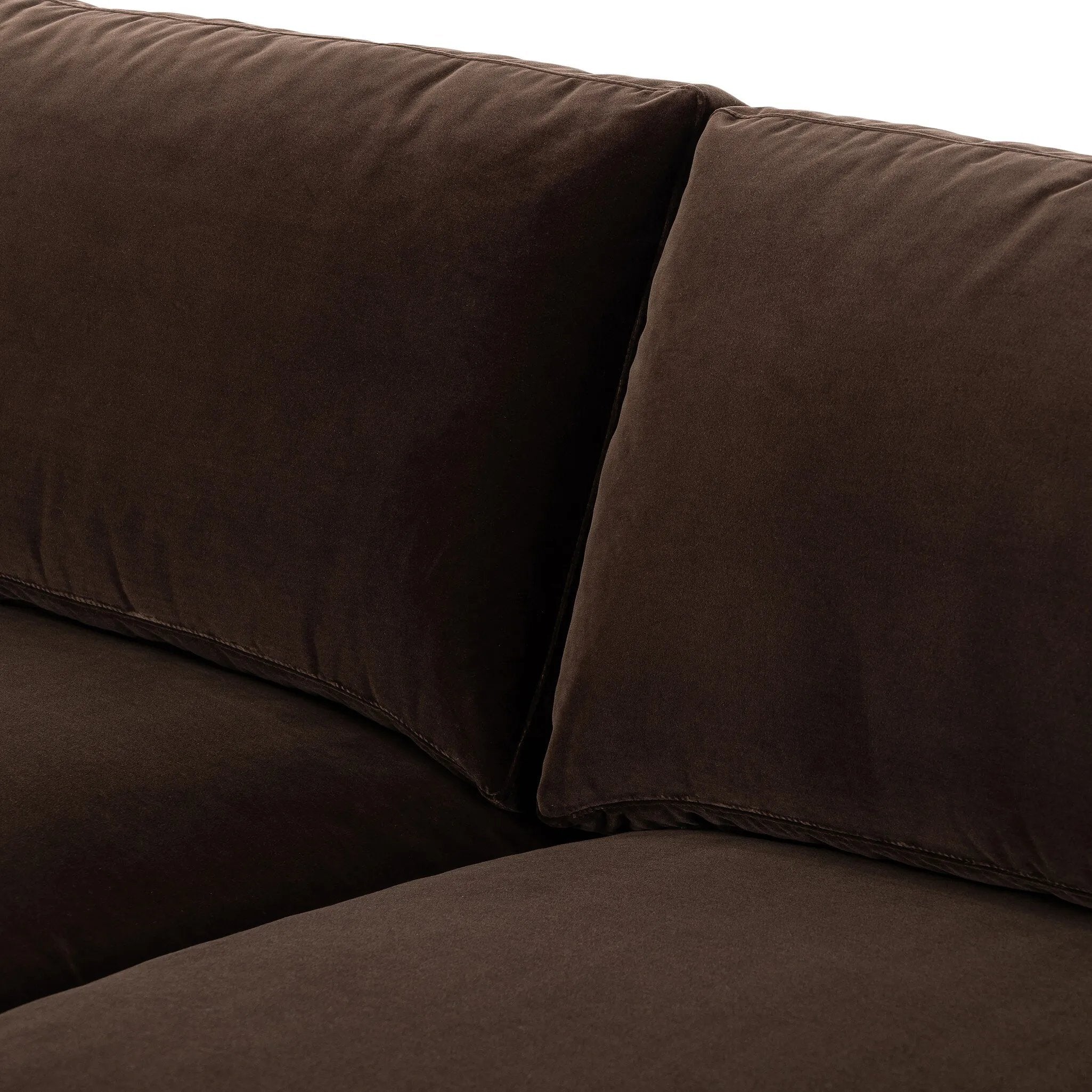 Float-style this unique sofa in a room to show off design details like sleek lines and rear cutouts. Designed with S spring construction, foam and fiber seat cushioning and loose feather-blend back cushions. Upholstered in a soft, velvety cotton. Amethyst Home provides interior design, new home construction design consulting, vintage area rugs, and lighting in the Los Angeles metro area.