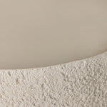 Heavy texture of pumice concrete with a smooth top sets this up as an essential transitional piece for any outdoor style. A statement cylindrical shape lifted by cutout legs contrasts bold design with an airy lightness. Cover or store indoors during inclement weather and when not in use Amethyst Home provides interior design, new home construction design consulting, vintage area rugs, and lighting in the Alpharetta metro area.