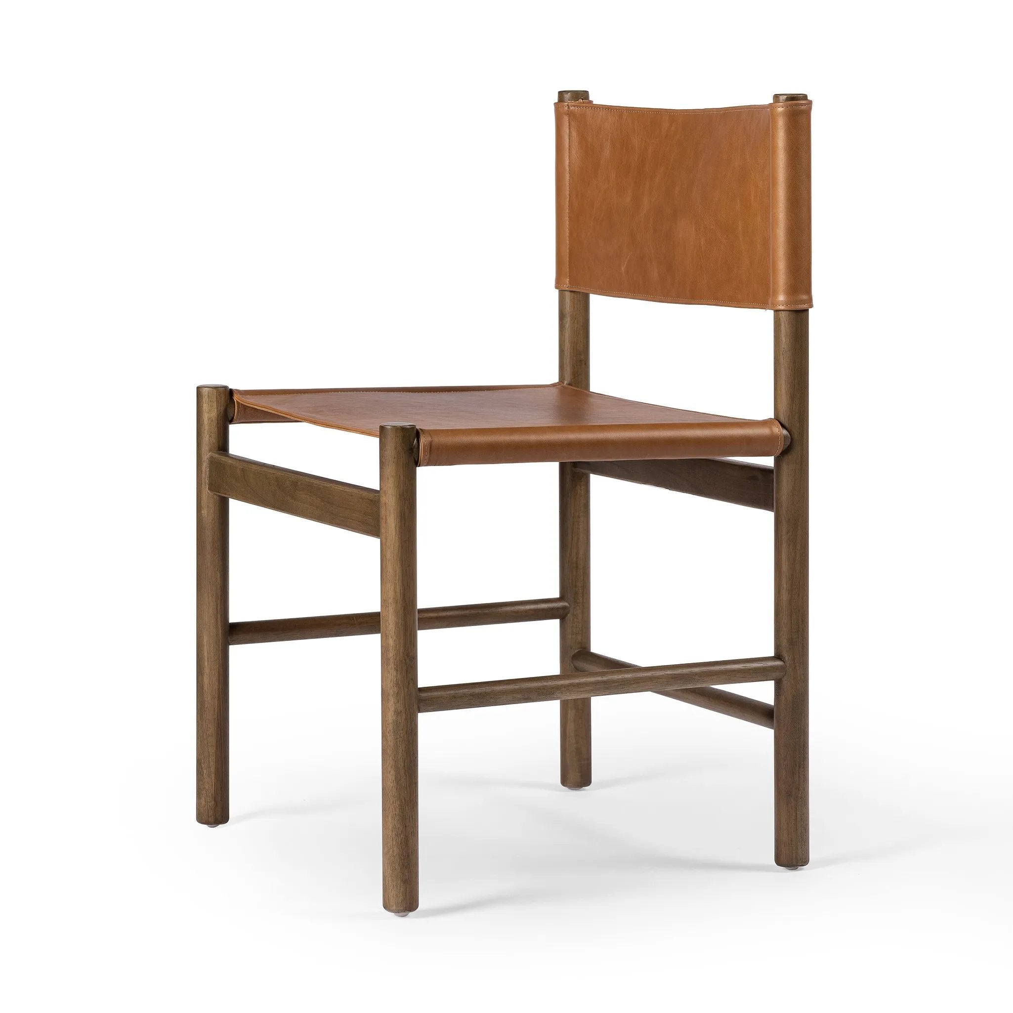 Solid parawood forms a simple, vintage-inspired frame for sling-style seating of top-grain leather exclusive to Four Hands Amethyst Home provides interior design, new home construction design consulting, vintage area rugs, and lighting in the Alpharetta metro area.