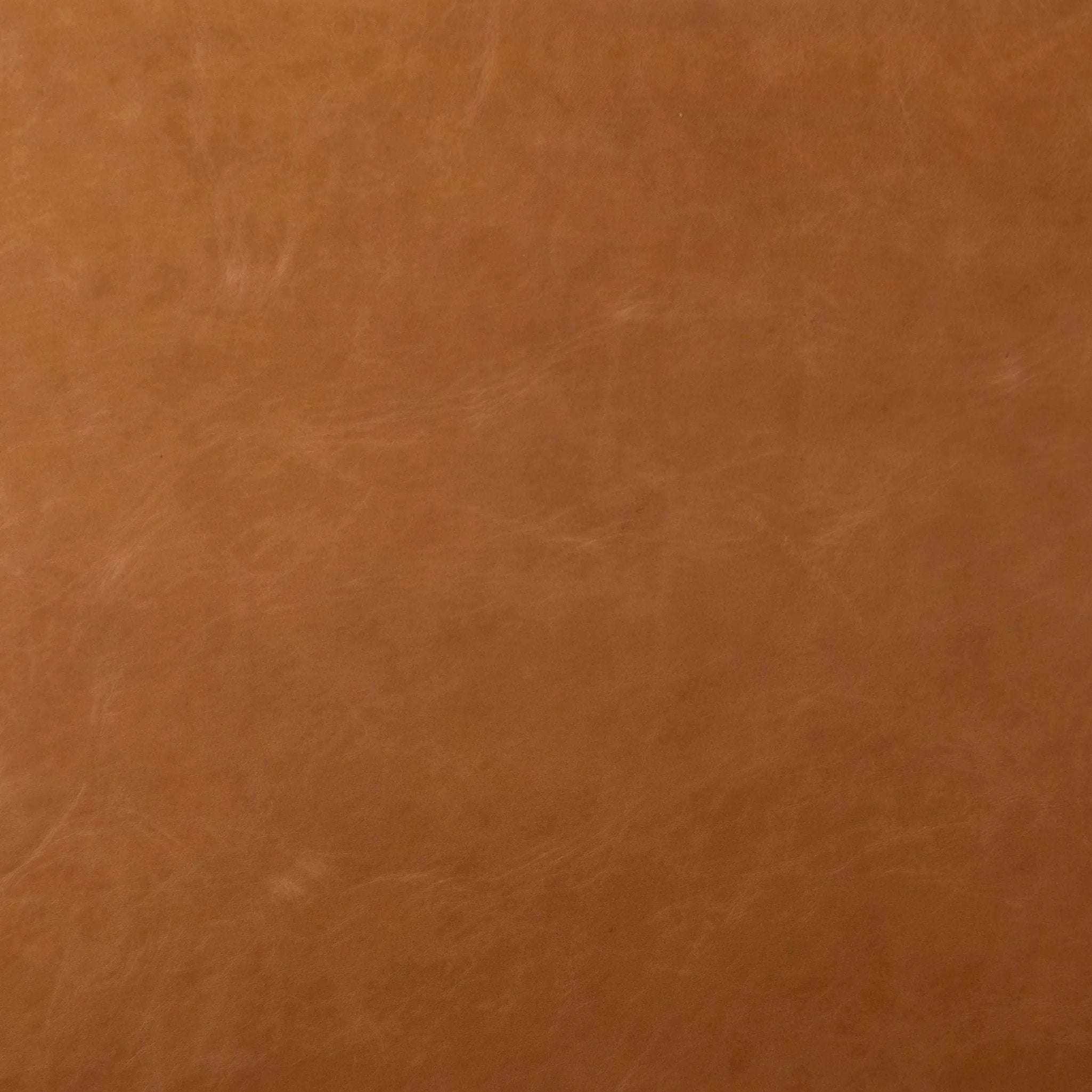 Solid parawood forms a simple, vintage-inspired frame for sling-style seating of top-grain leather exclusive to Four Hands Amethyst Home provides interior design, new home construction design consulting, vintage area rugs, and lighting in the Houston metro area.