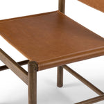 Solid parawood forms a simple, vintage-inspired frame for sling-style seating of top-grain leather exclusive to Four Hands Amethyst Home provides interior design, new home construction design consulting, vintage area rugs, and lighting in the Laguna Beach metro area.