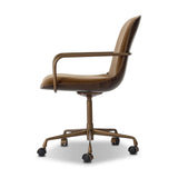Our mixed material take on the midcentury molded ply chair. Plush ochre velvet seating pairs with a wooden back of rich brown burl and burnished brass arms that wrap under the seat and behind the back, for a continuous, flowing feel. This design-forward material mix creates a tonal and textural contrast that feels both found and fresh. Amethyst Home provides interior design, new home construction design consulting, vintage area rugs, and lighting in the Boston metro area.