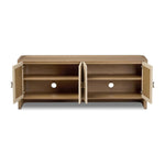 Bring storage to your living space or media room with a monochromatic media console of sandy oak and painted linen, with split-circle iron hardware. A spacious interior features removable shelving to custom suit your needs. Rear cutouts for cord management.As lovers of clean aesthetics at Amethyst, we love the nature inspired Kiran Media Console. Amethyst Home provides interior design, new home construction design consulting, vintage area rugs, and lighting in the Dallas metro area.