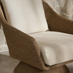 Featuring Koe Ellor Beige Outdoor Chair by Four Hands at Amethyst Home. Bring texture outside. Inspired by the classic tulip shape, this outdoor swivel chair features a sculptural, woven faux hyacinth frame and a deep seat and loose back cushion in 100% olefin, known for its UV-resistant, water-repellent and quick-drying abilities. Cover or store indoo. Amethyst Home provides interior design, new home construction design consulting, vintage area rugs, and lighting in the Salt Lake City metro area.