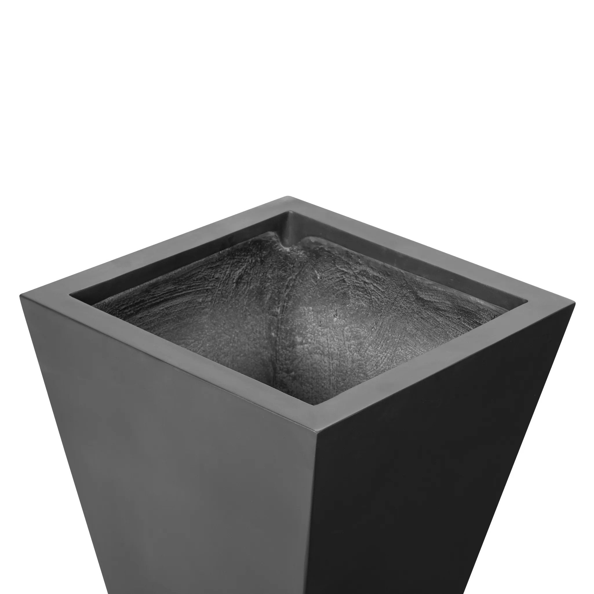 Cast black concrete forms a monolithic planter for use indoors and out. Cover or store indoors during inclement weather and when not in use Amethyst Home provides interior design, new home construction design consulting, vintage area rugs, and lighting in the San Diego metro area.