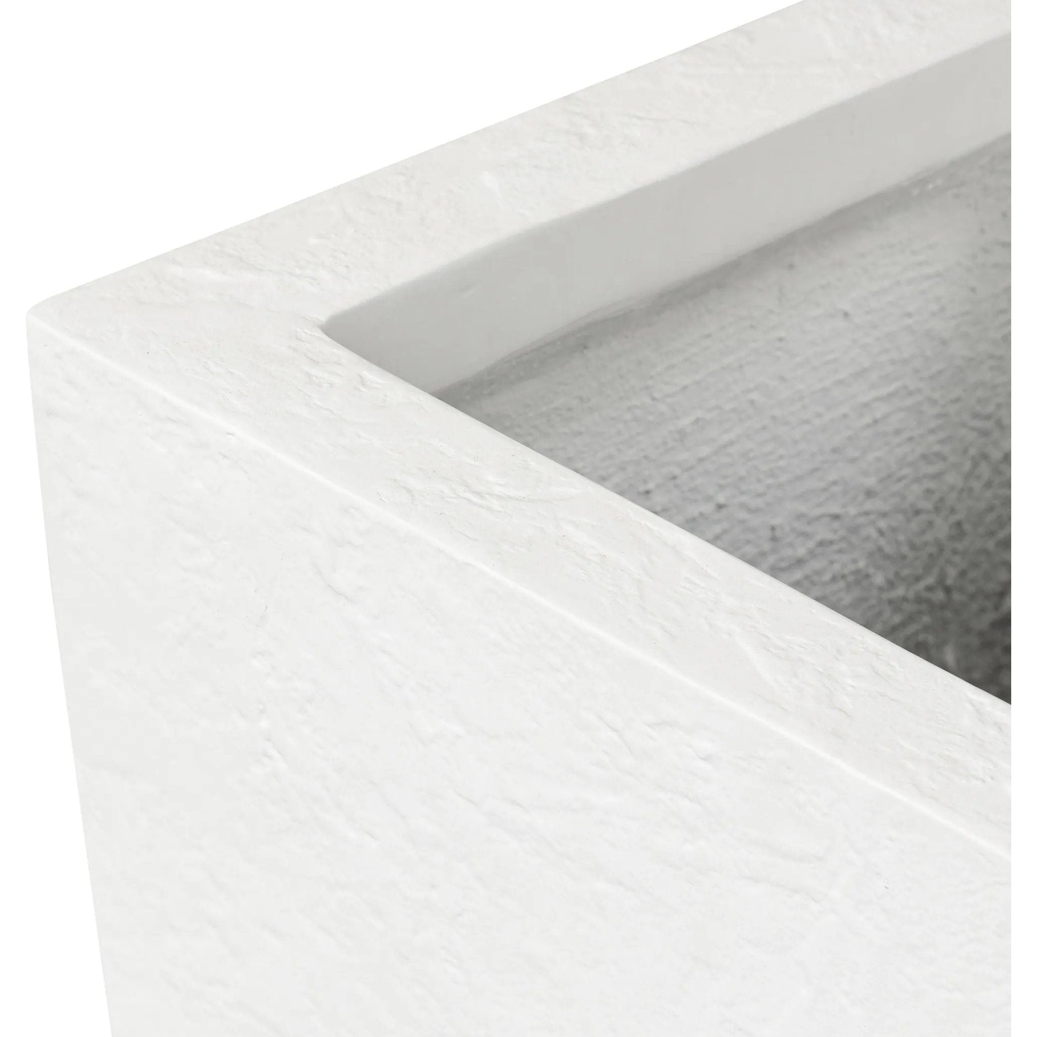 Cast black concrete forms a monolithic planter for use indoors and out. Cover or store indoors during inclement weather and when not in use Amethyst Home provides interior design, new home construction design consulting, vintage area rugs, and lighting in the Alpharetta metro area.
