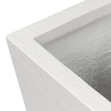 Cast black concrete forms a monolithic planter for use indoors and out. Cover or store indoors during inclement weather and when not in use Amethyst Home provides interior design, new home construction design consulting, vintage area rugs, and lighting in the Kansas City metro area.