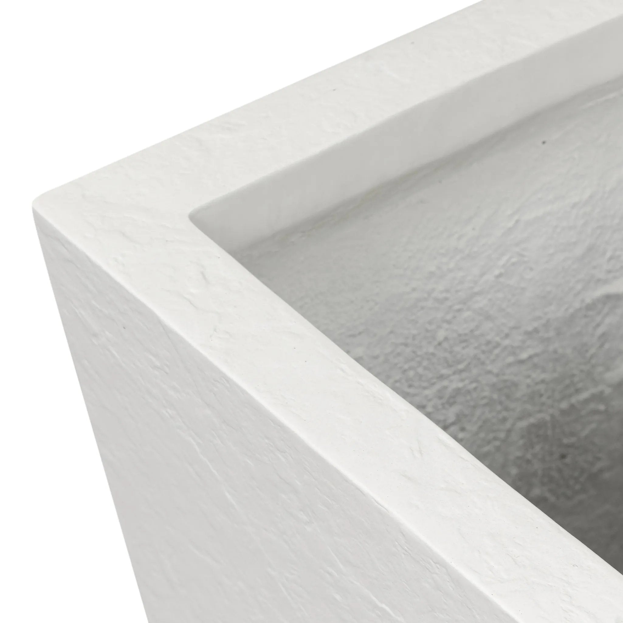 Cast black concrete forms a monolithic planter for use indoors and out. Cover or store indoors during inclement weather and when not in use Amethyst Home provides interior design, new home construction design consulting, vintage area rugs, and lighting in the Kansas City metro area.