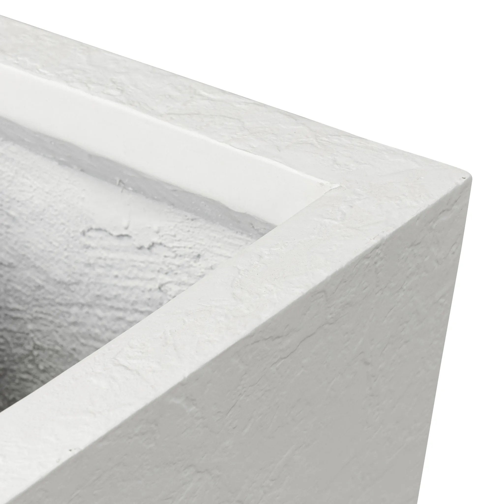 Cast black concrete forms a monolithic planter for use indoors and out. Cover or store indoors during inclement weather and when not in use Amethyst Home provides interior design, new home construction design consulting, vintage area rugs, and lighting in the Miami metro area.