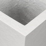 Cast black concrete forms a monolithic planter for use indoors and out. Cover or store indoors during inclement weather and when not in use Amethyst Home provides interior design, new home construction design consulting, vintage area rugs, and lighting in the Nashville metro area.