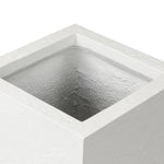 Cast black concrete forms a monolithic planter for use indoors and out. Cover or store indoors during inclement weather and when not in use Amethyst Home provides interior design, new home construction design consulting, vintage area rugs, and lighting in the Newport Beach metro area.