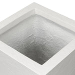 Cast black concrete forms a monolithic planter for use indoors and out. Cover or store indoors during inclement weather and when not in use Amethyst Home provides interior design, new home construction design consulting, vintage area rugs, and lighting in the Salt Lake City metro area.