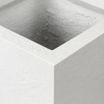 Cast black concrete forms a monolithic planter for use indoors and out. Cover or store indoors during inclement weather and when not in use Amethyst Home provides interior design, new home construction design consulting, vintage area rugs, and lighting in the Seattle metro area.