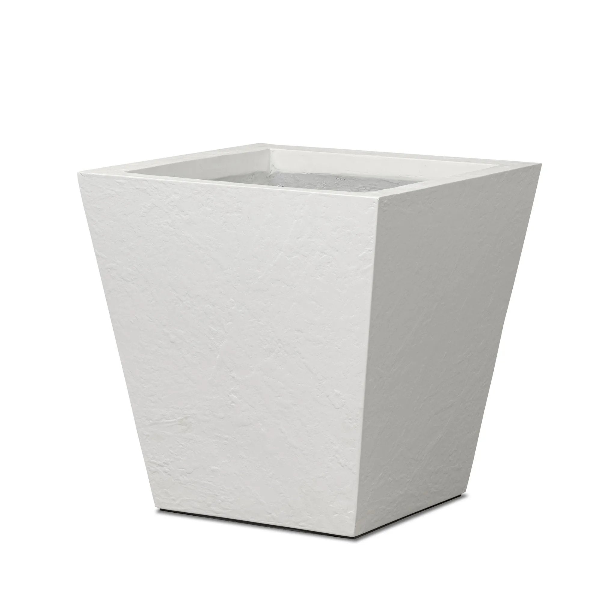 Cast black concrete forms a monolithic planter for use indoors and out. Cover or store indoors during inclement weather and when not in use Amethyst Home provides interior design, new home construction design consulting, vintage area rugs, and lighting in the Tampa metro area.