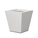 Cast black concrete forms a monolithic planter for use indoors and out. Cover or store indoors during inclement weather and when not in use Amethyst Home provides interior design, new home construction design consulting, vintage area rugs, and lighting in the Washington metro area.