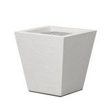 Cast black concrete forms a monolithic planter for use indoors and out. Cover or store indoors during inclement weather and when not in use Amethyst Home provides interior design, new home construction design consulting, vintage area rugs, and lighting in the Washington metro area.