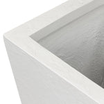 Cast black concrete forms a monolithic planter for use indoors and out. Cover or store indoors during inclement weather and when not in use Amethyst Home provides interior design, new home construction design consulting, vintage area rugs, and lighting in the Winter Garden metro area.